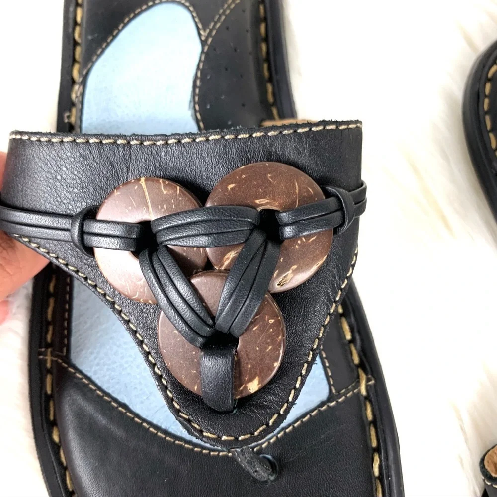 Born black thong sandals disc trim